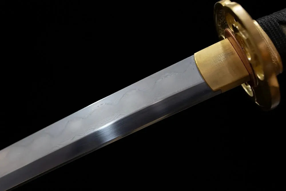 Upper T10 clay‑tempered long katana blade brass habaki mixed‑suguha compound‑style hamon temper‑line macro close‑up