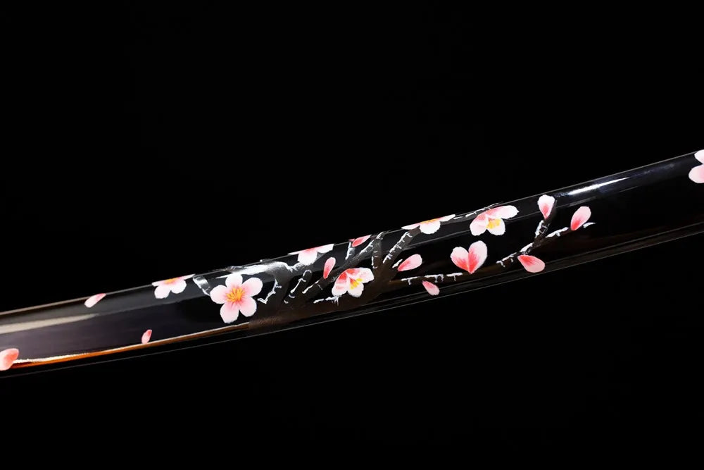 Mid‑section high‑gloss‑black lacquer hardwood katana saya hand‑painted pink‑white sakura graphic texture close‑up