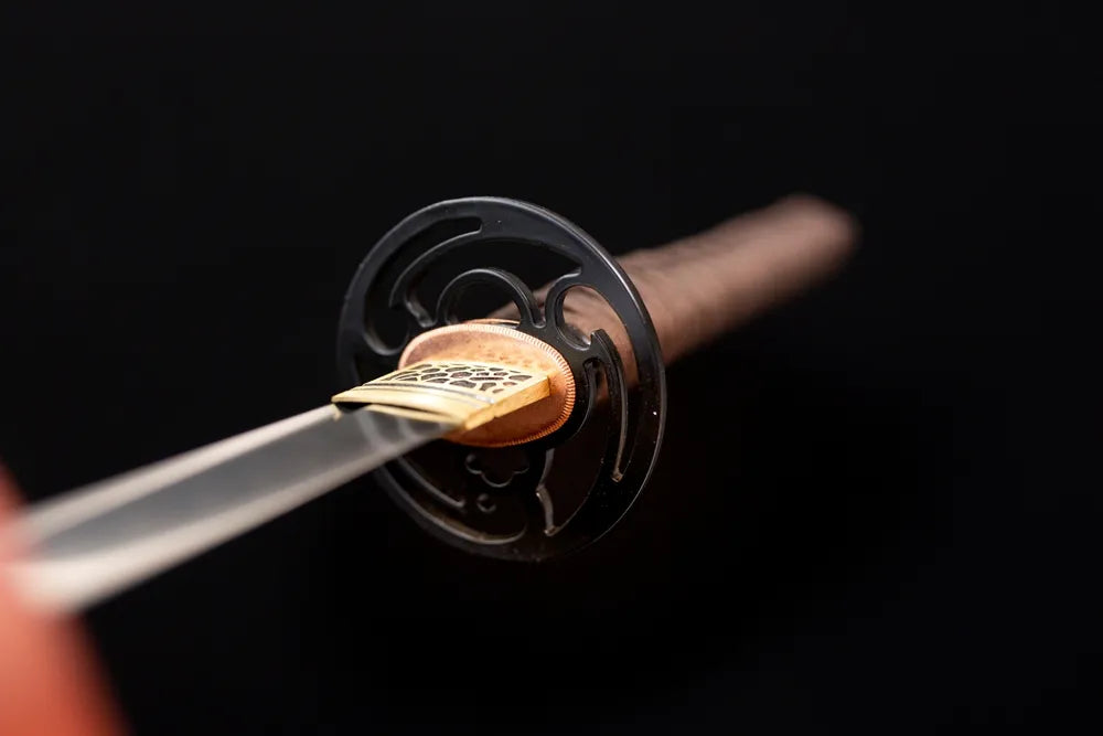 Front plain‑open‑work simple‑understated‑relief matte‑alloy katana hand‑guard close‑up