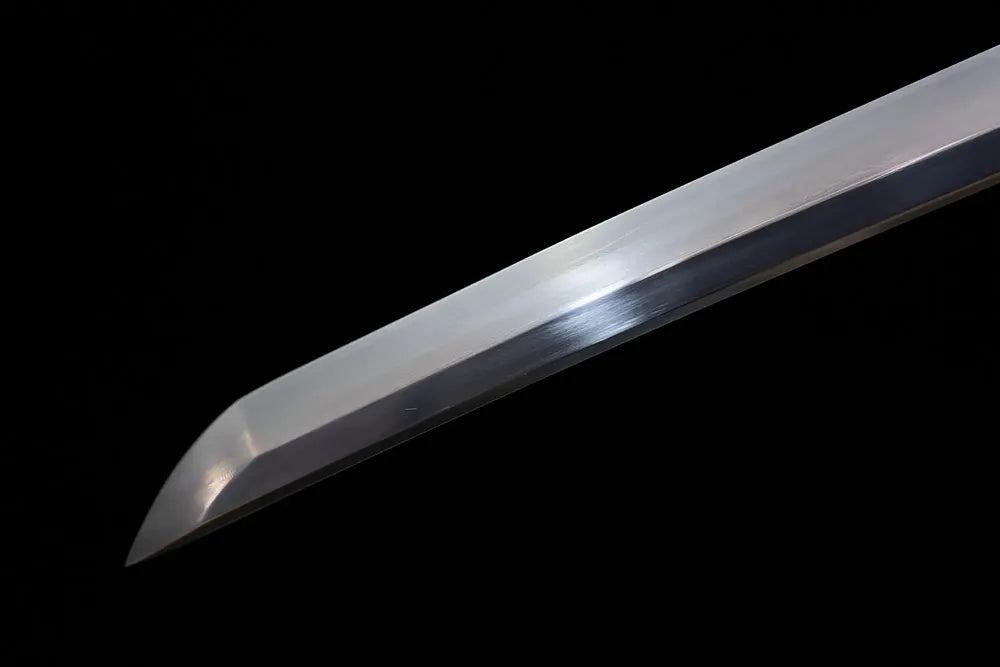 Classic functional katana‑style kissaki tip of Storm‑Katana blade close‑up view