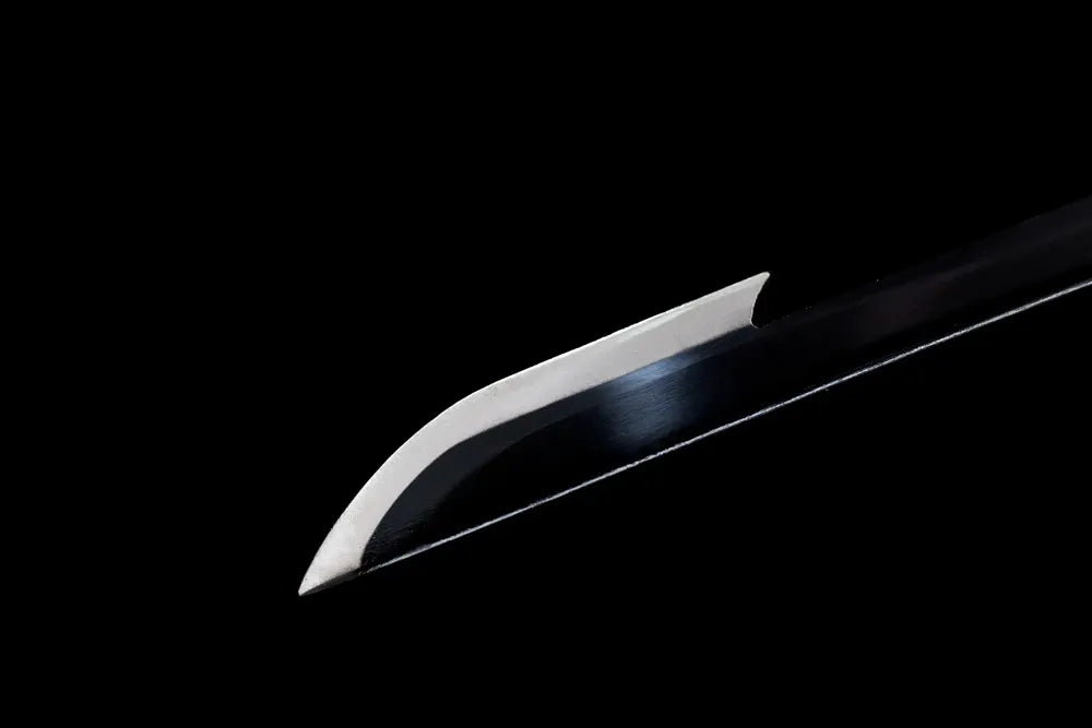 Slender sharp insect‑style kissaki Shinobu blade tip close view