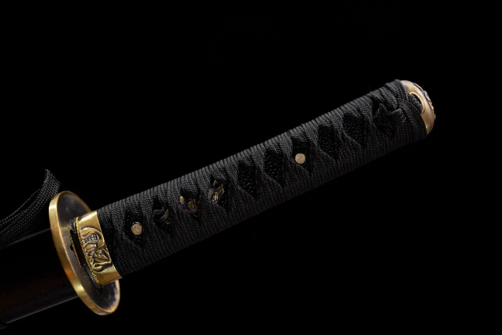 Full black woven tsuka demon‑mask engraved brass fittings complete front shot