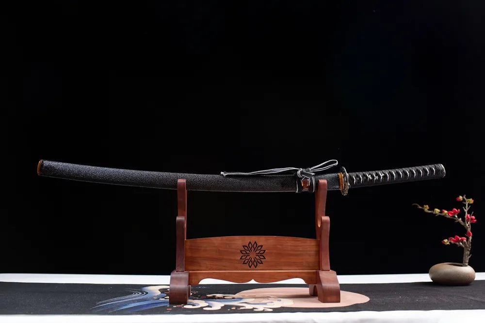 Horizontal laid closed black grain ray skin scabbard ocean samurai sword