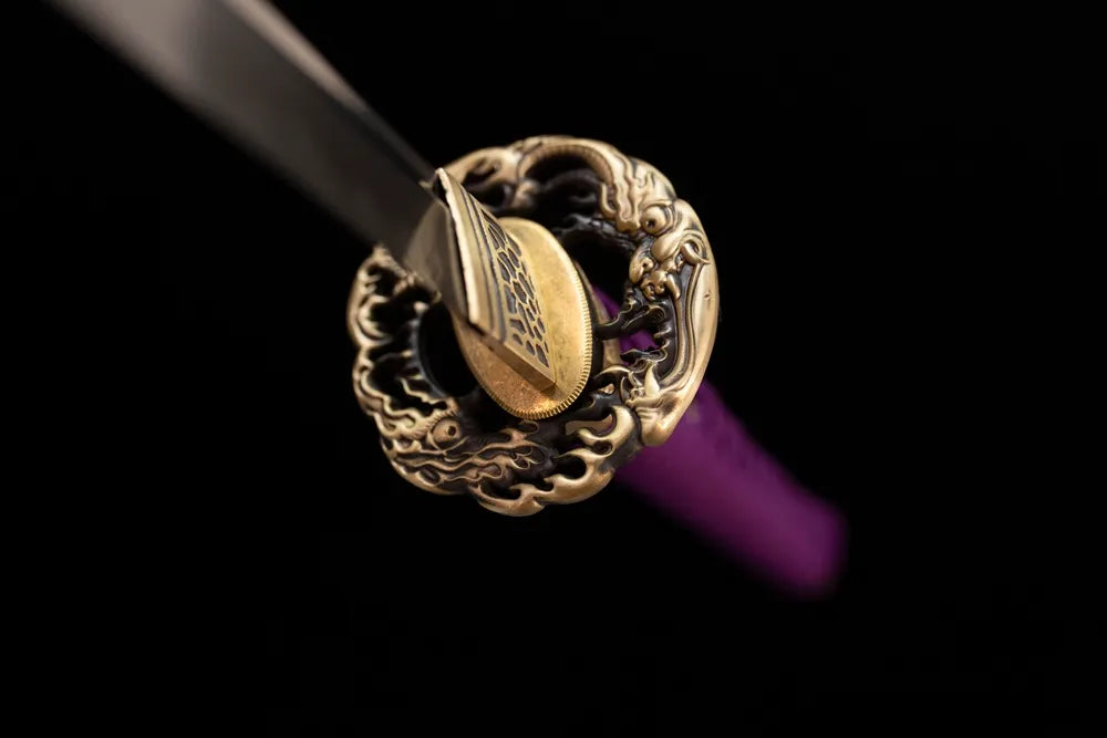 Front open‑work raijin‑fujin cloud‑relief vintage‑gild katana hand‑guard close‑up