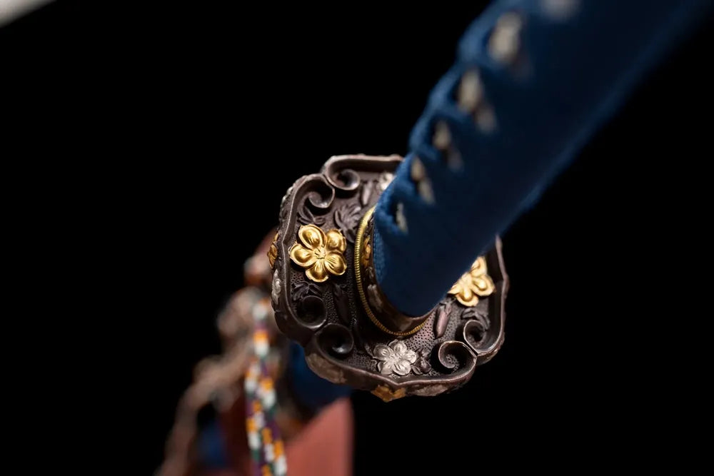 Reverse‑side floral‑mon carving gold‑silver‑plated copper tsuba surface texture close‑up