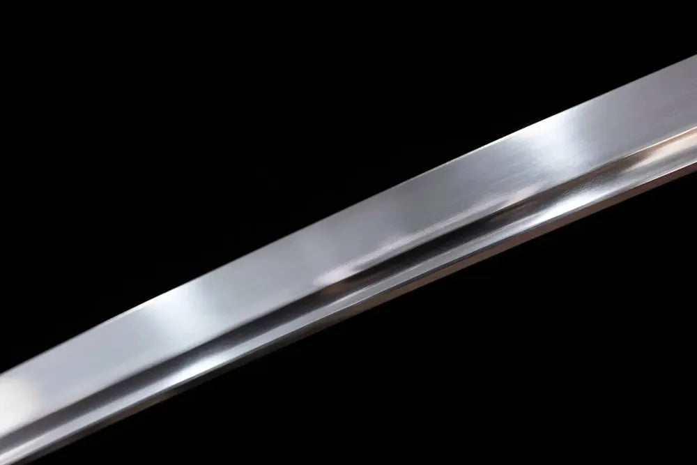 Mid‑section taganeha hand‑polished plain steel katana blade surface close‑up shot