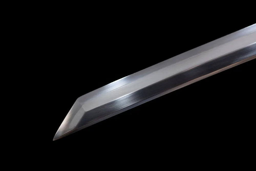Classic smooth kissaki tip of Ink‑Style‑Katana blade close‑up view