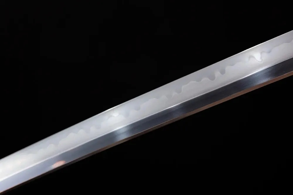 Mid‑section midare‑choji surging‑ocean‑tide layered‑wave‑pattern hamon steel katana blade surface close‑up shot