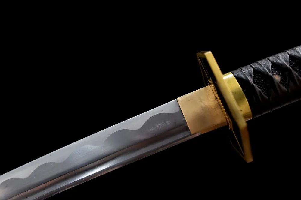 Upper choji wave hamon thin brass habaki macro close-up