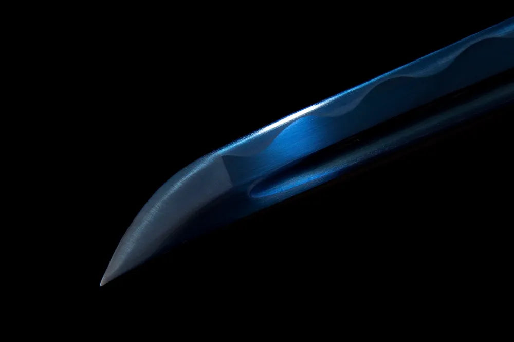 Kissaki tip closeup bright blue fully polished sharp blade tip