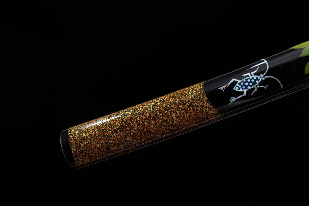 Bottom speckled gold lacquer saya end cap