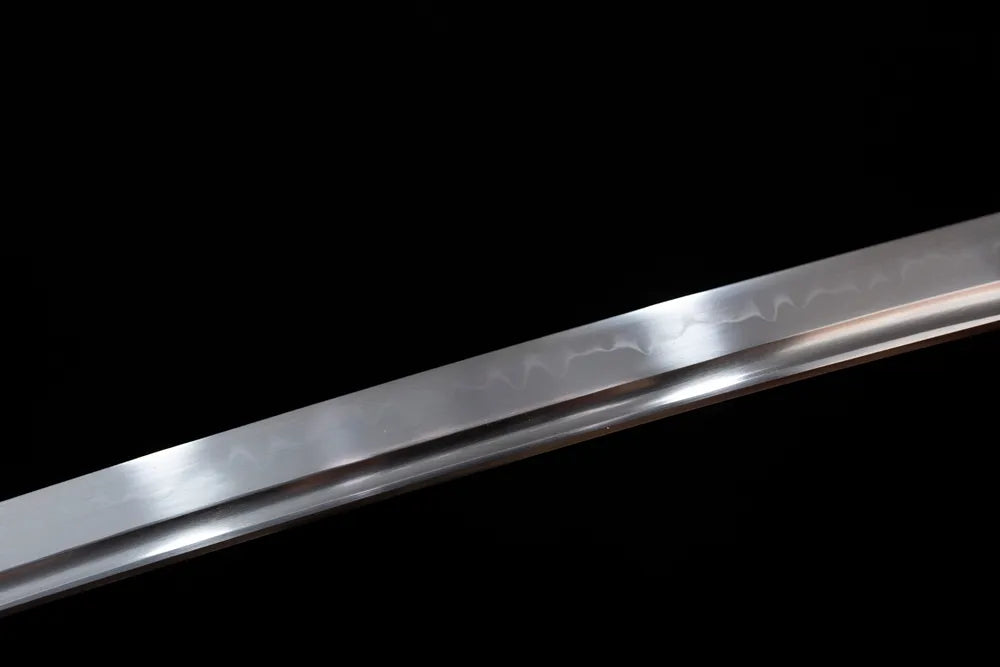 Mid‑section gunome undulating‑wave‑pattern hamon steel katana blade surface close‑up shot‑long katana