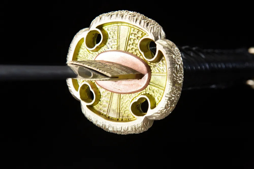 Front side four-hole hollow flower gilded brass hand guard