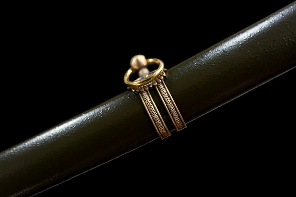 Mid‑section military‑green lacquer hardwood saya hanging‑ring brass fitting texture close‑up