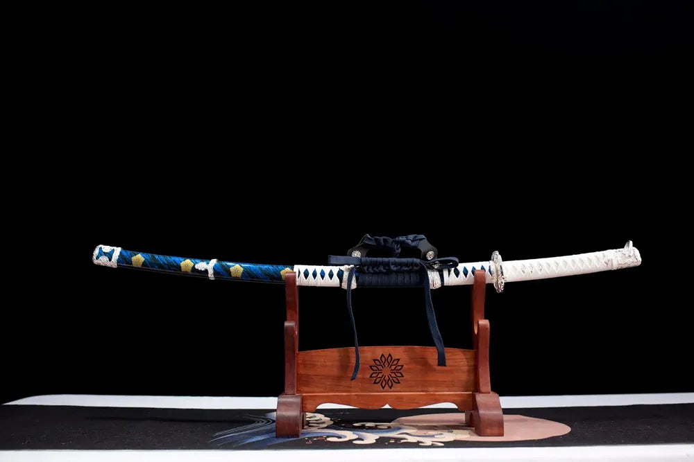 Horizontal laid closed deep‑blue gold‑mon Mitsuhide‑Akechi‑Tachi scabbard flat table‑top front display