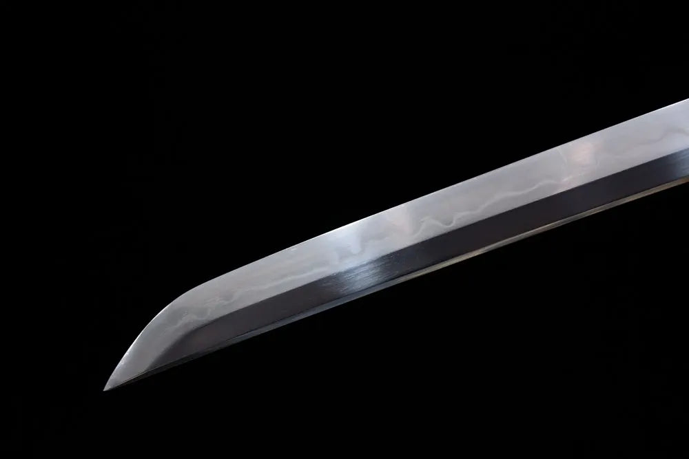 Classic functional katana‑style kissaki tip of Forest‑Tiger‑Katana blade close‑up view