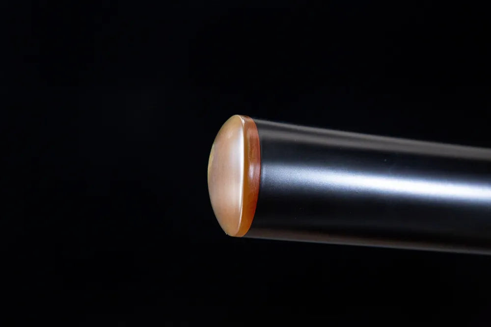 Bottom saya closeup smooth black sheath amber ox horn end cap