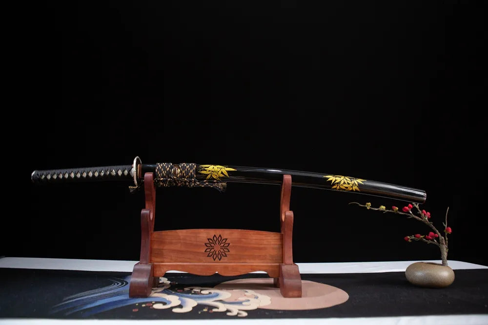 Horizontal laid closed black lacquer bamboo painted samurai sword