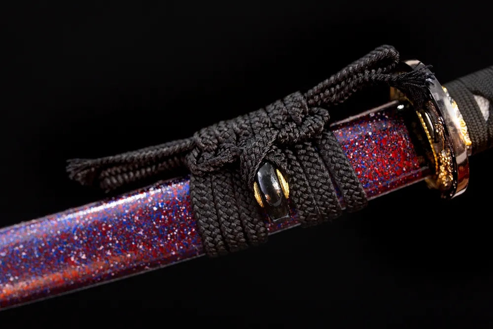 Thin mini black‑braided sageo cord gilded‑alloy fitting macro close‑up‑short wakizashi