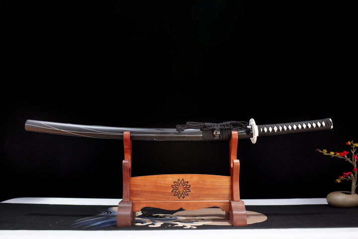 This katana（samurai sword） is forged from Damascus steel. The surface is oxidized and blackened