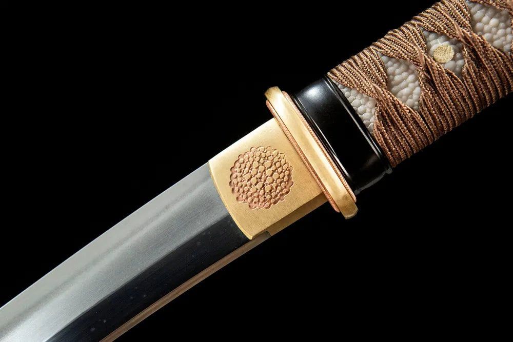 Night Wakizashi upper blade detail near tsuba, Uzi steel texture