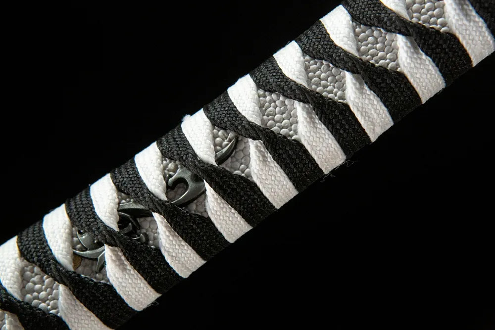 Demon Girl Katana handle front view, imitation ray skin under wrap