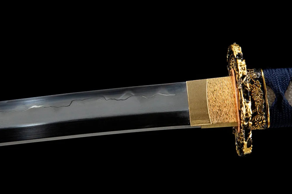 Upper blade closeup Orange Full neat gunome hamon near solid copper habaki real yokote