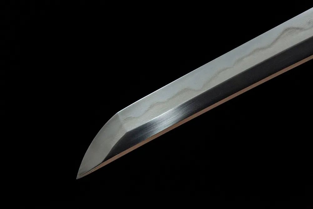 Flaring Fire Katana kissaki tip closeup, sharp polished cutting edge