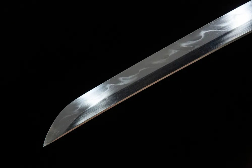 Kissaki tip closeup The Firmament Tachi, fine polished sharp cutting edge plain uncarved blade