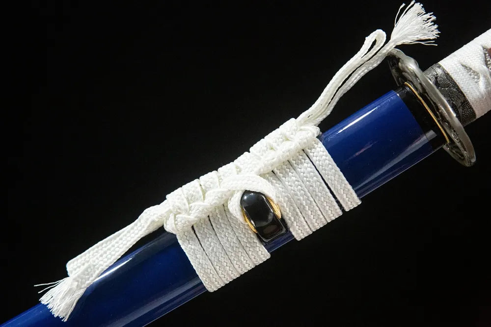 Pure white woven cotton sageo cord tied around saya ring of Snow Prunus Mume Katana