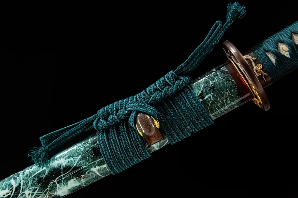 Coarse cotton sageo cord tied on ox horn kurikata saya ring