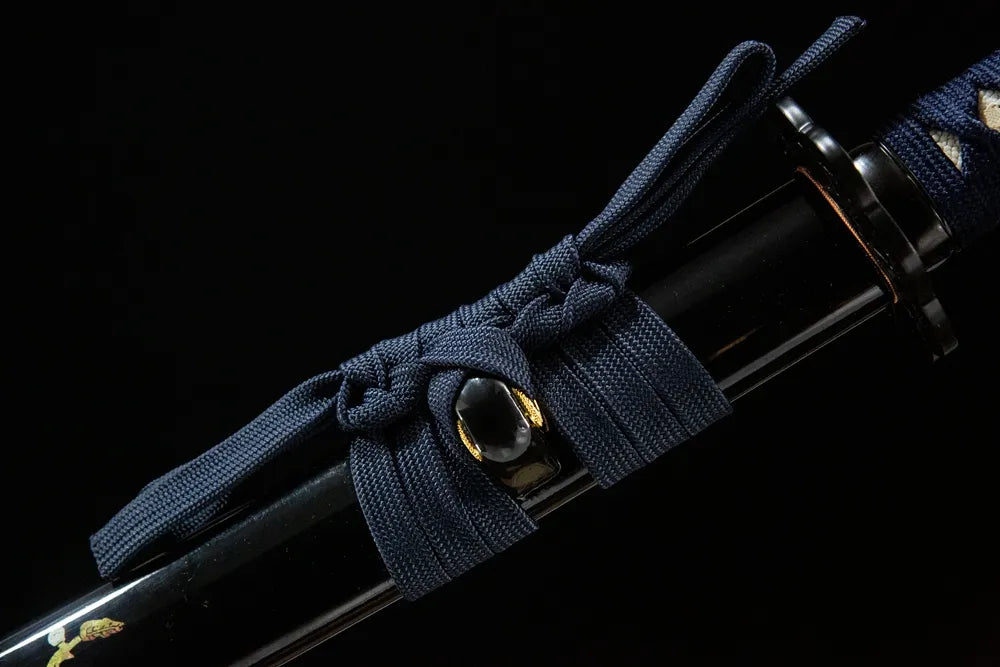 Navy blue woven cotton sageo cord tied around saya ring of Hummingbird Wakizashi