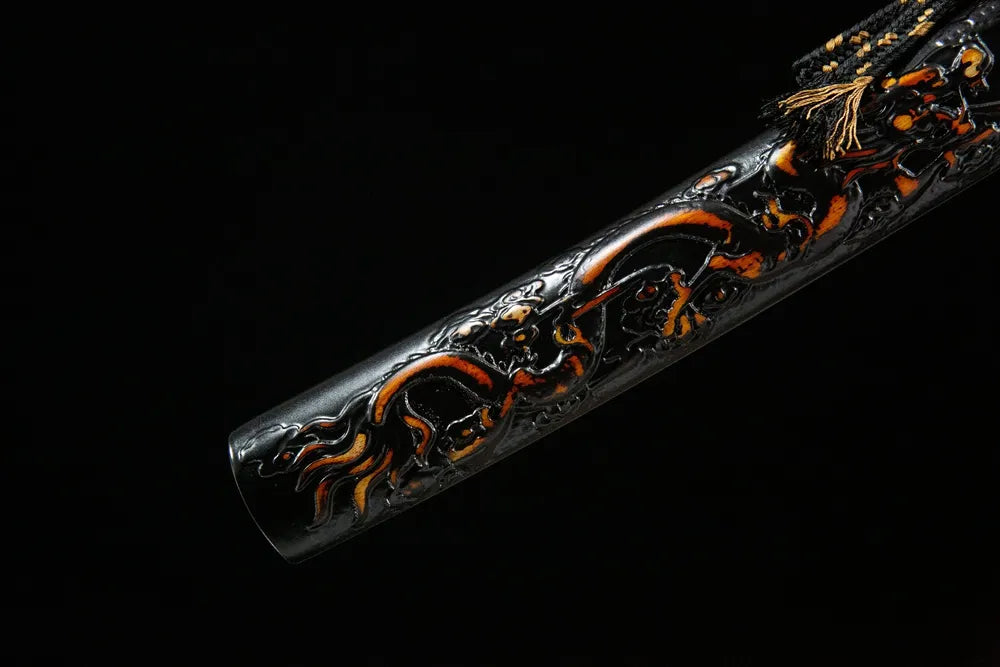 Bottom saya closeup Battle Dragon Wakizashi solid ox kojiri end cap carved dragon scabbard