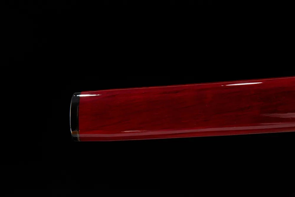 Bottom saya closeup solid ox horn kojiri end cap smooth wood sheath