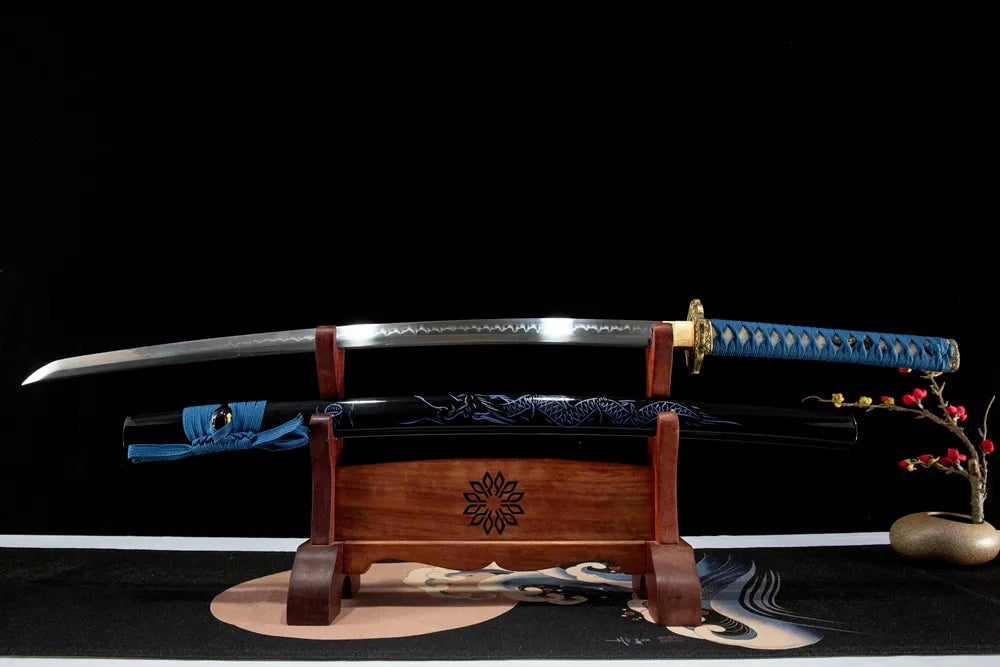 Unsheathed Buddha Lotus horizontal shot T10 clay tempered gunome maru blade