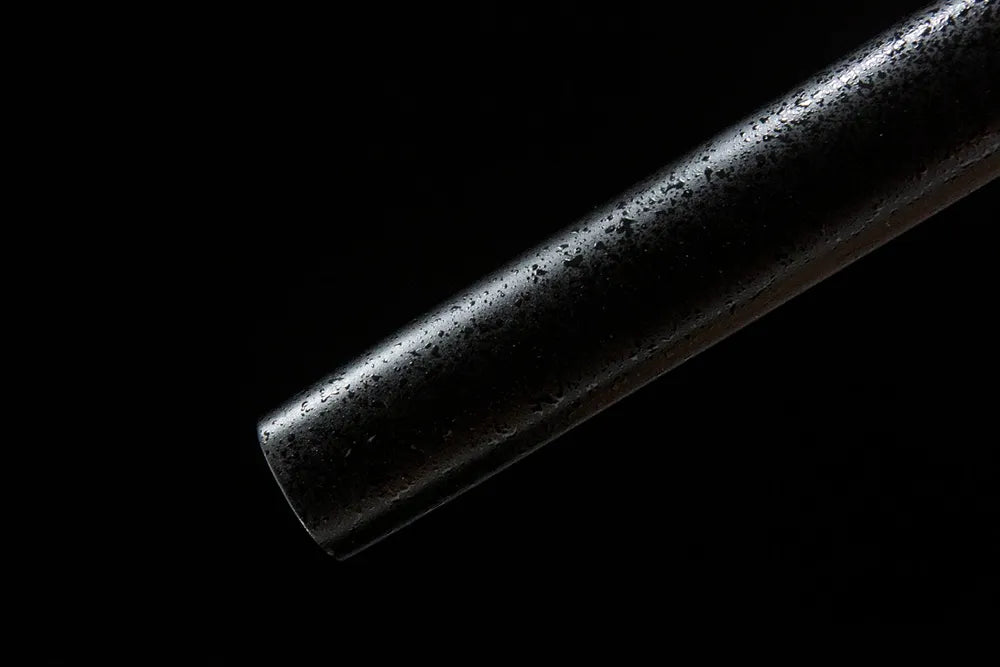 Bottom saya closeup smooth black paint short sheath end cap