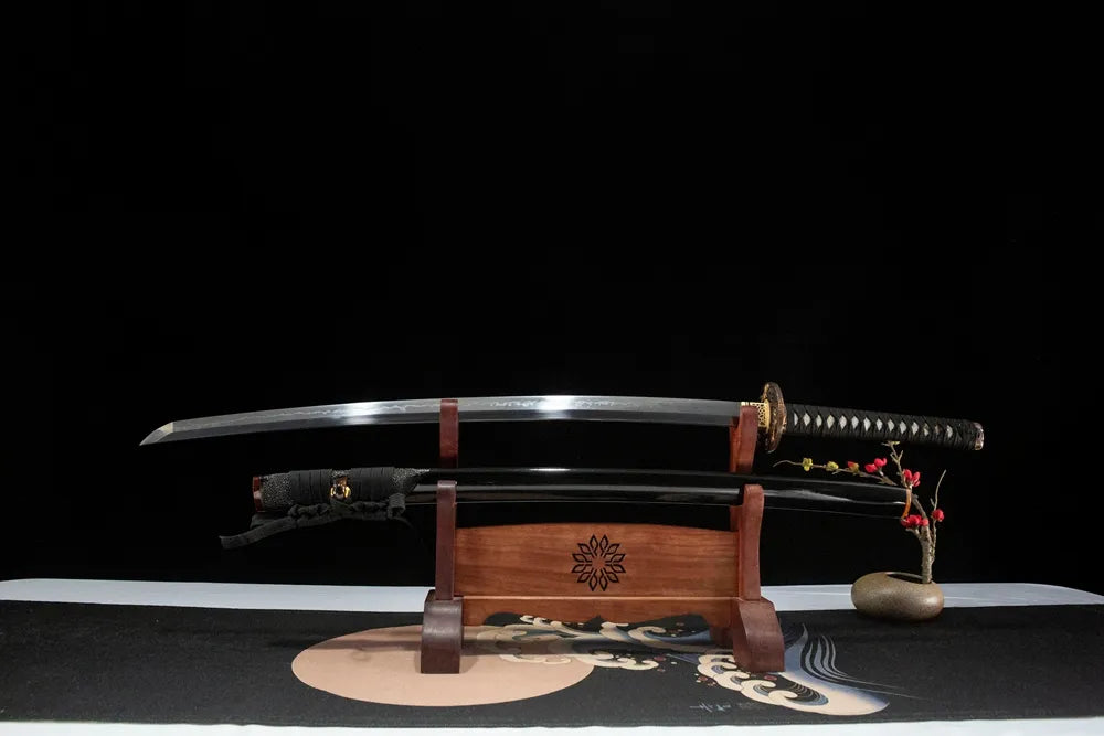 Unsheathed Red-Crowned Crane Katana horizontal shot, solid maru T10 blade natural mottled clay temper hamon