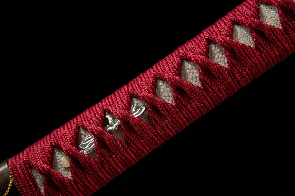 Red Dragonfly Katana handle closeup, Moro-hineri-maki wrap texture