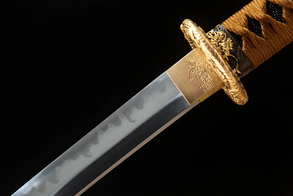 Upper blade closeup neat rounded gunome wave hamon near solid copper habaki
