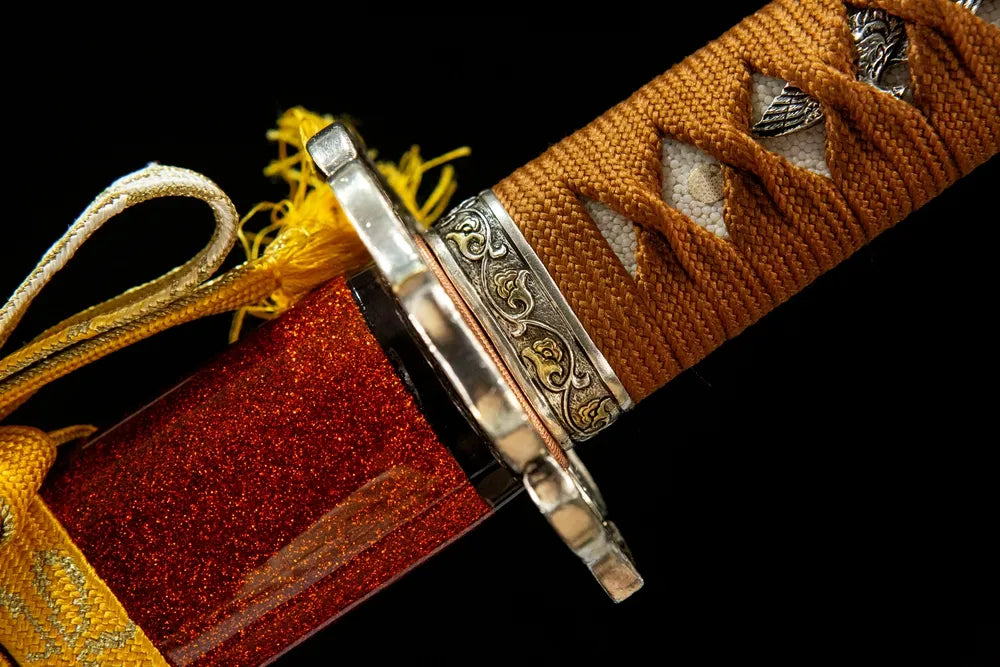 Flaring Fire Katana fuchi closeup, gold silver plated copper flame motif