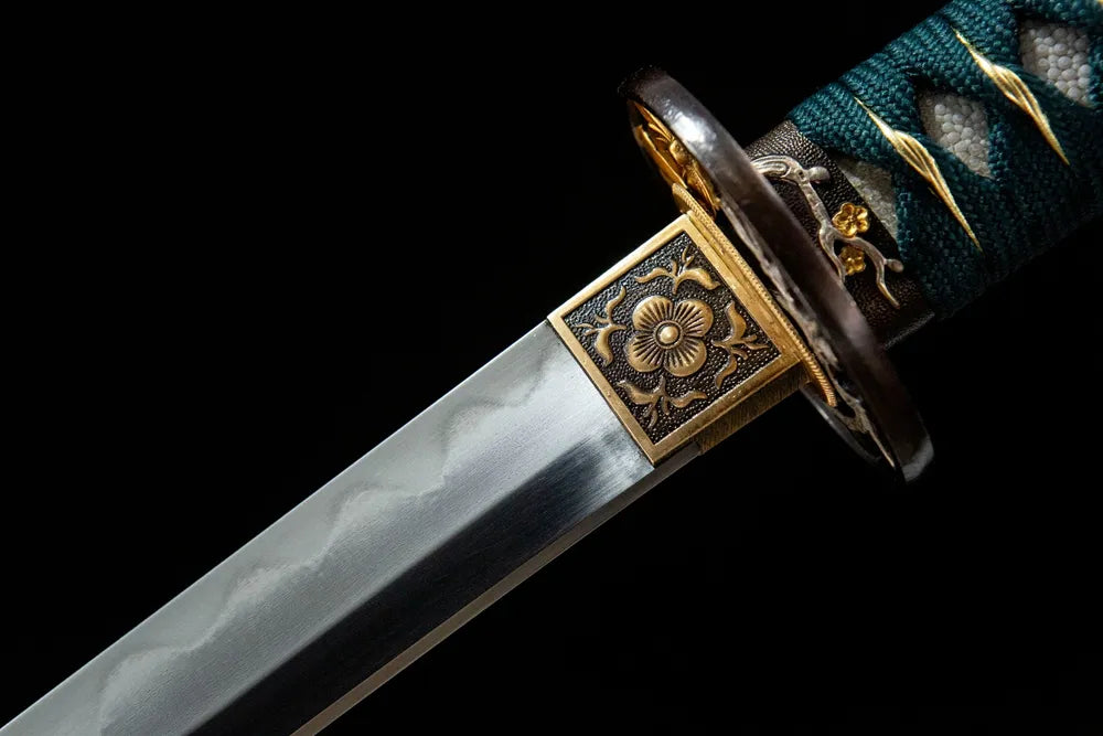 Lotus Heart Katana upper blade detail, Gunome hamon near copper habaki Uzi steel