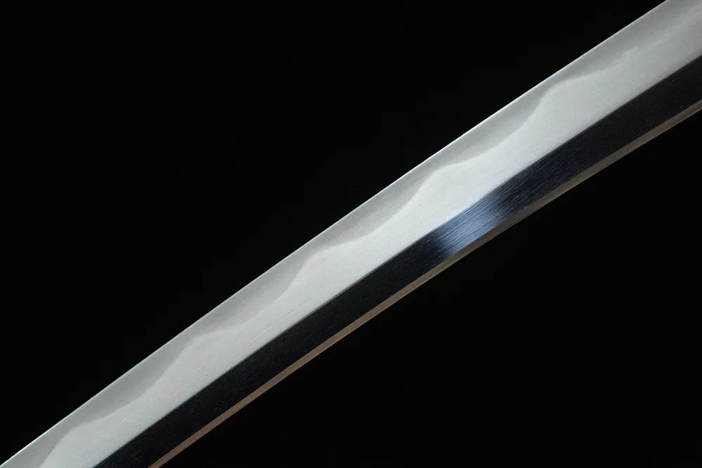 Middle blade detail Hummingbird Wakizashi, continuous semicircle gonome temper line fine ground T8 surface