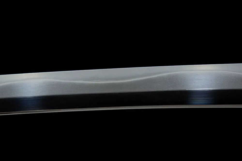 Middle blade detail continuous gentle notare wave temper line fine polished steel surface