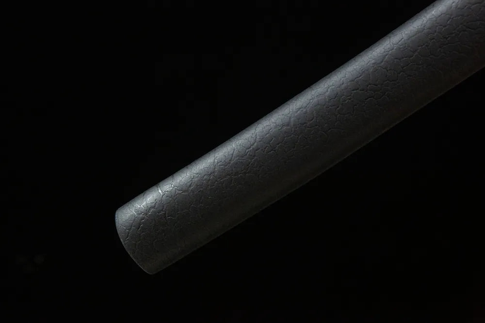 Bottom saya closeup Mingyuan Katana smooth crackle lacquer solid wood sheath end cap