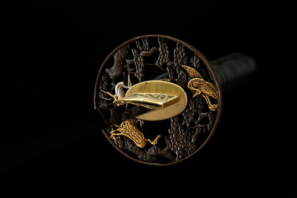 Front side of Red-Crowned Crane Katana tsuba, full carved crane motif gold silver copper guard