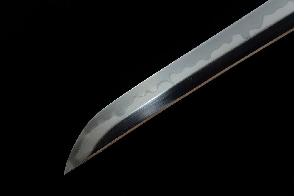 Kissaki tip closeup The Firmament Tachi, fine polished sharp cutting edge plain uncarved blade