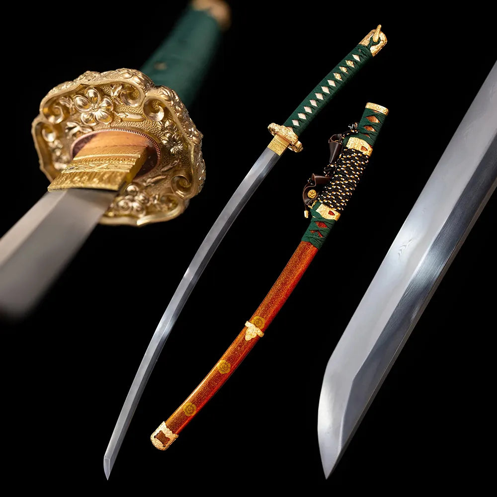 Nobunaga‑Orange‑Tachi sengoku oda‑nobunaga azuchi‑momoyama daimyo‑historical tachi long sword drawn T10 gunome‑midare sengoku‑sharp layered undulating hamon blade orange‑red gold‑maki‑e kamon‑crest saya full black‑background studio shot