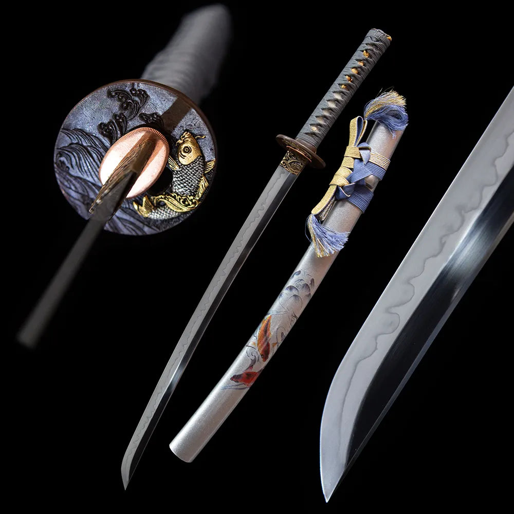 Koi fish wakizashi blade and silver scabbard full black background shot