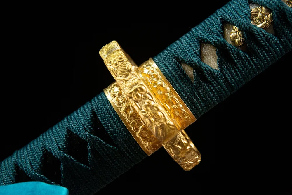 Chrysanthemum Pattern Tachi fuchi, solid copper handle collar closeup