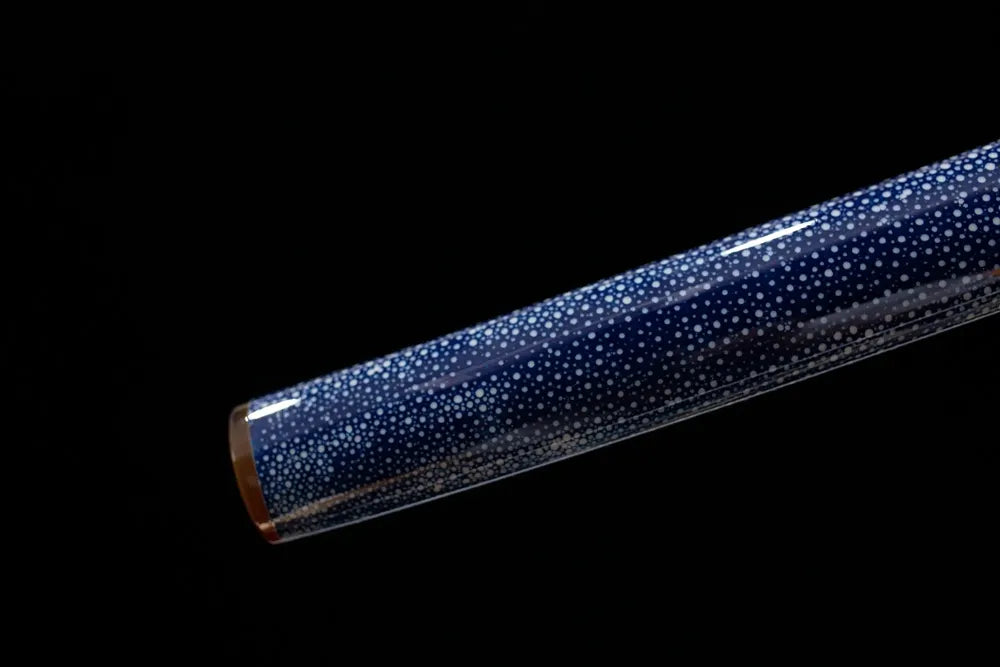 Bottom ice‑blue moon‑pearl maki‑e saya ice‑blue silver‑gild kojiri end‑cap close‑up